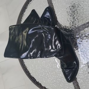 Italian black leather boots with tan leather lining.